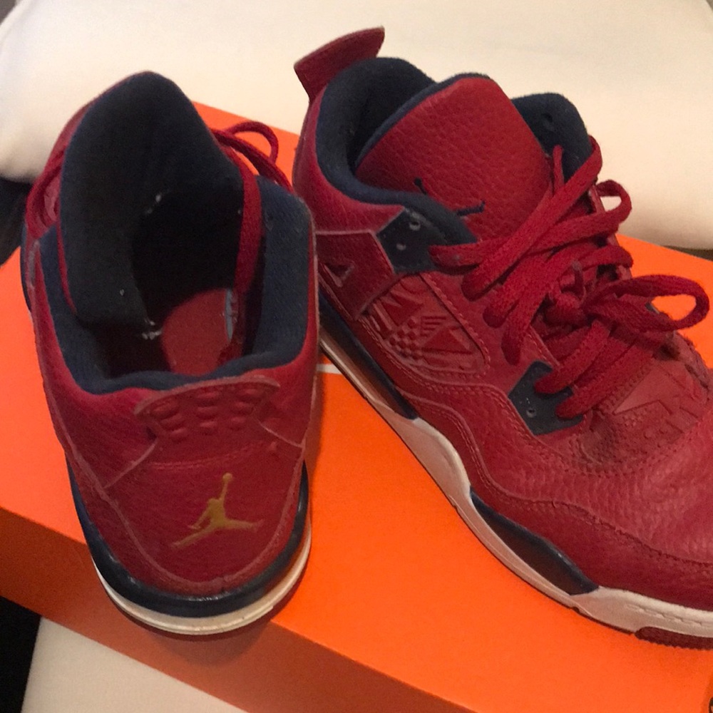 Kids red Jordan 4’s